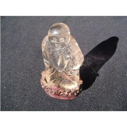 Antique rock crystal carving featuring Buddha #1290536