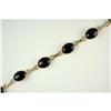 Image 1 : 14K GOLD BRACELET BLACK ONYX 24 CARATS! #1238045