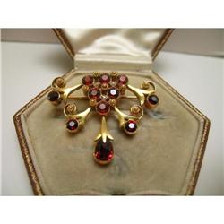Edwardian 15 Ct. Gold and Garnet Brooch #1292335