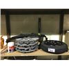 Image 1 : SHELF LOT WITH GM HIDE A WAY TIRE AND 4 17" HUBCAPS AND MORE