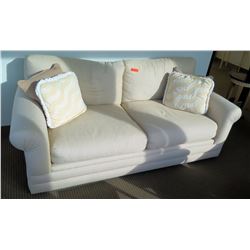 White Upholstered Loveseat w/ Accent Pillows