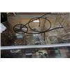 Image 2 : White decorative metal tricycle planter and black wheelbarrow planter