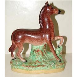 ENGLISH POTTERY HORSE FIGURINE