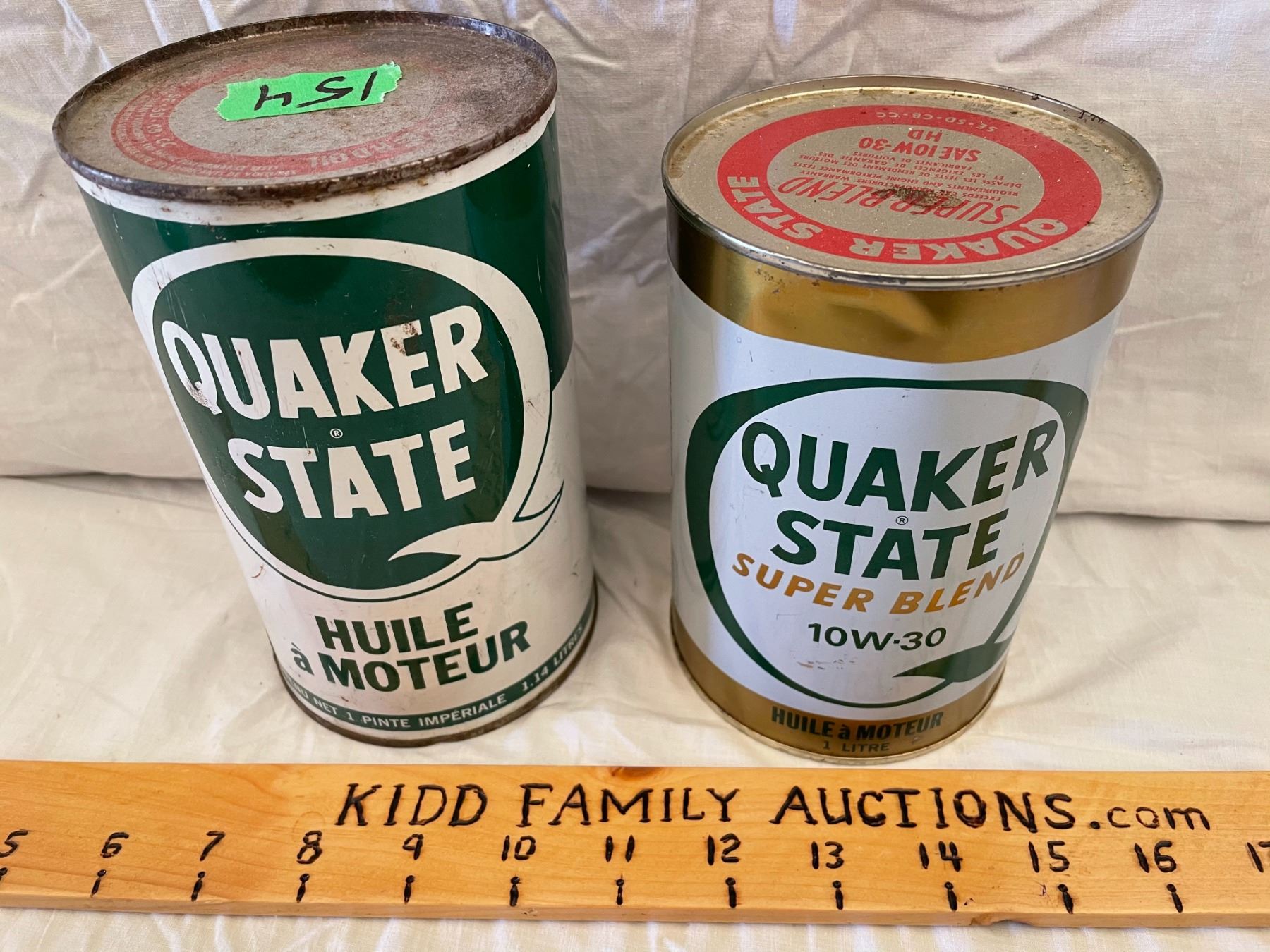 LOT OF 2 QUAKER STATE OIL CANS FULL Kidd Family Auctions