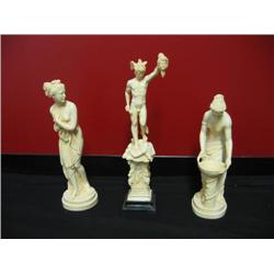 Three alabaster statues