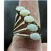 Image 1 : Ring with 5 opals set on a diagonal in 14kt #1256374