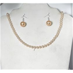 18)  STRAND OF PALE PINK PEARLS, 20" IN