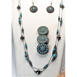 21)  SUITE OF BRONZE AND TURQUOISE