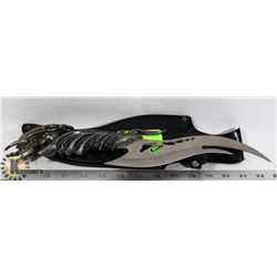DECORATIVE ALIEN HANDLED STEEL HEAVY KNIFE.