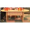 Image 1 : NEW WOOD TONE OVAL SHAPED TABLE 70 X 29