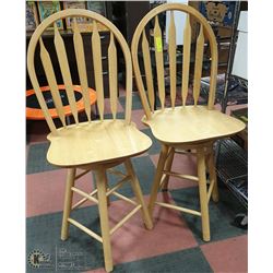 TWO WOODEN SWIVEL BAR CHAIRS