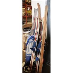 LOT OF SKIS AND WATER SKIIS