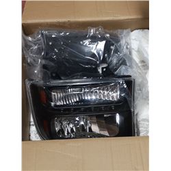 PAIR OF HEADLIGHTS FOR VEHICLE UNKNOWN. NO PART OR