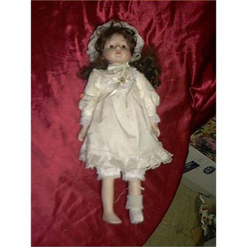 100 year old porcelain doll