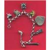 Image 1 : SILVER CHARM BRACELET WITH 8 CHARMS/WORLD TRA #1270304