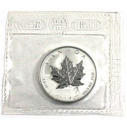 2004 Canada 1oz Libra Privy Mark .9999 Fine Silver Maple Leaf (Coin has some toning spots). TAX Exem