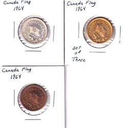 1964 Canada's Own Flag 3-coin Token Set. Each token is made from a different metal (white and gold c