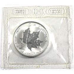 2001 Canada $5 Snake Privy Mark 1oz. Silver Maple Leaf issued by the Mint (TAX Exempt). Lightly Tone