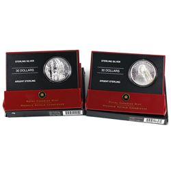 2007 Totem & 2007 Vimy  $30 Sterling Silver coins are toned and packaging  contains some wear. 2pcs
