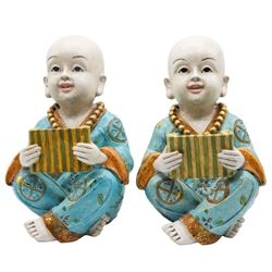 Pair of Buddhist Children Figures