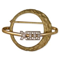 Jack Swigert's personally owned diamond and 14K gold Apollo XIII lapel pin. According to flight Comm