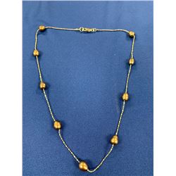 Gold Pearl Type Necklace