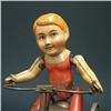 Image 2 : German tin wind-up toy; child riding tr