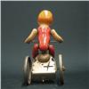 Image 4 : German tin wind-up toy; child riding tr
