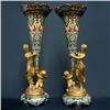 Image 1 : A pair of champleve figural mantle vase