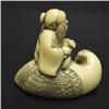 Image 3 : Carved ivory netsuke; old man with cran