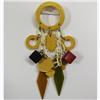 Image 1 : Multicolored bakelite dangle pin measur