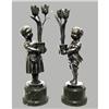 Image 1 : A pair of bronze figural candleholders;