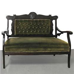 Walnut Victorian settee; mask carving o