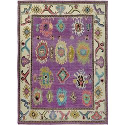 A WOOL HAND KNOTTEDTURKISH ORIENTAL AREA RUG.