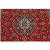Image 4 : A WOOL HAND KNOTTED FLORAL ORIENTAL AREA RUG.