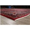 Image 11 : A WOOL HAND KNOTTED FLORAL ORIENTAL AREA RUG.