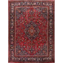 A WOOL HAND KNOTTED FLORAL ORIENTAL AREA RUG.