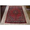 Image 2 : A WOOL HAND KNOTTED FLORAL ORIENTAL AREA RUG.