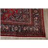 Image 6 : A WOOL HAND KNOTTED FLORAL ORIENTAL AREA RUG.
