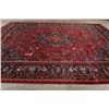 Image 9 : A WOOL HAND KNOTTED FLORAL ORIENTAL AREA RUG.