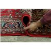 Image 12 : A WOOL HAND KNOTTED FLORAL MEDALLION AREA RUG.
