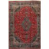 Image 1 : A WOOL HAND KNOTTED FLORAL MEDALLION AREA RUG.