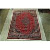 Image 2 : A WOOL HAND KNOTTED FLORAL MEDALLION AREA RUG.