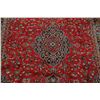 Image 4 : A WOOL HAND KNOTTED FLORAL MEDALLION AREA RUG.