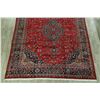 Image 5 : A WOOL HAND KNOTTED FLORAL MEDALLION AREA RUG.