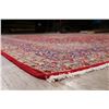 Image 11 : A WOOL HAND KNOTTED FLORAL MEDALLION AREA RUG.