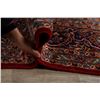 Image 12 : A WOOL HAND KNOTTED FLORAL MEDALLION AREA RUG.