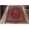 Image 2 : A WOOL HAND KNOTTED FLORAL MEDALLION AREA RUG.