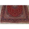 Image 5 : A WOOL HAND KNOTTED FLORAL MEDALLION AREA RUG.