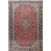 Image 1 : A WOOL HAND KNOTTED FLORAL ORIENTAL AREA RUG.
